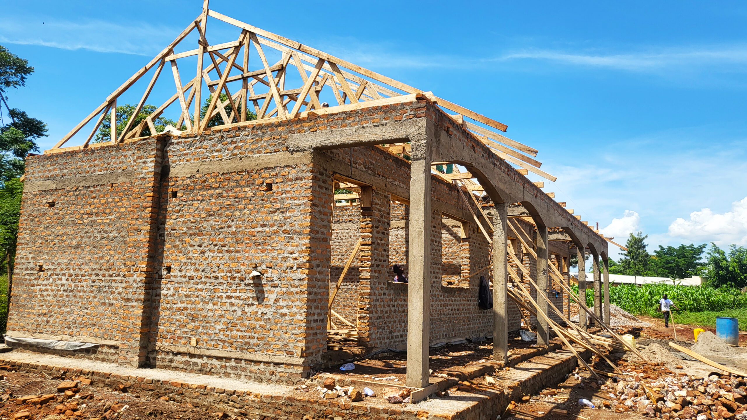 Side angle of the Technical Skilling Center showing full brickwork and roof structure