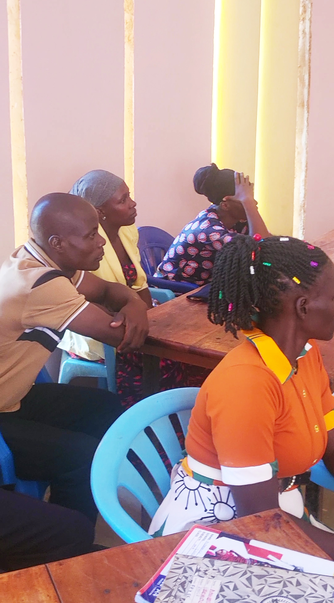 FFYEC teachers attentively listening during the staff meeting
